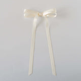 Olivia Picot Satin Bow in ivory, featuring charming picot edges and smooth satin ribbon, perfect for hairstyles.