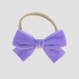 lavender Kayla velvet hair bow headband for baby girl.