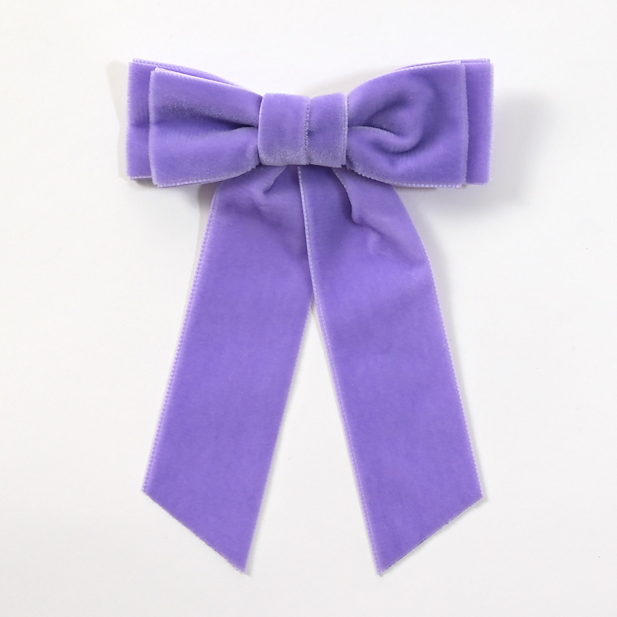 Lavender purple velvet Mia bow on a white background