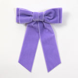 Lavender purple velvet Mia bow on a white background