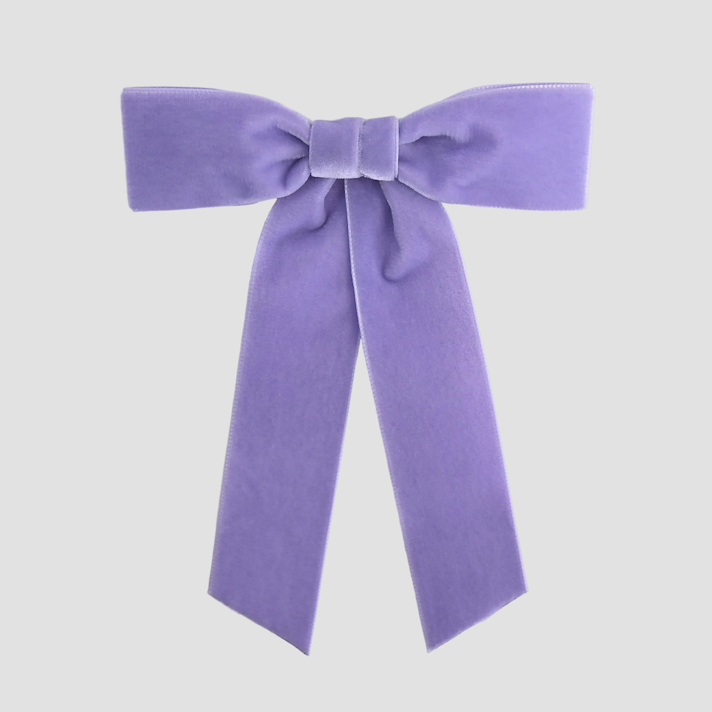 Lilac purple Zoe petite velvet hair bow on a white background.