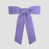 Lilac purple Zoe petite velvet hair bow on a white background.