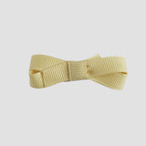 lemonade yellow bow on a white background