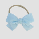 light blue Kayla velvet hair bow headband for baby girl.