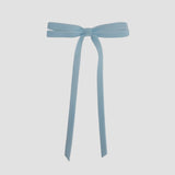 Light blue Olivia velvet hair bow for women with long tails on white background