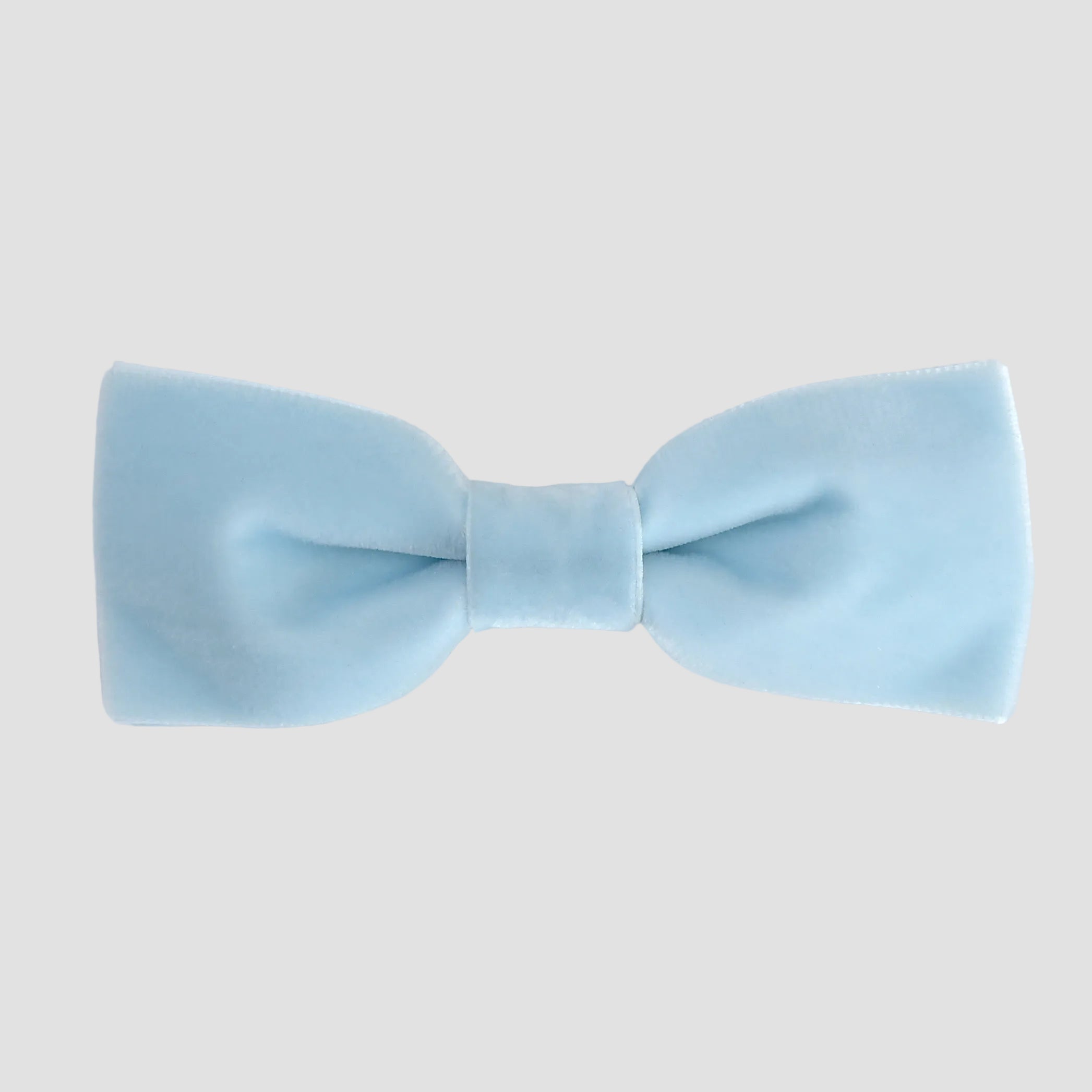 Light blue men bow tie on a white background.