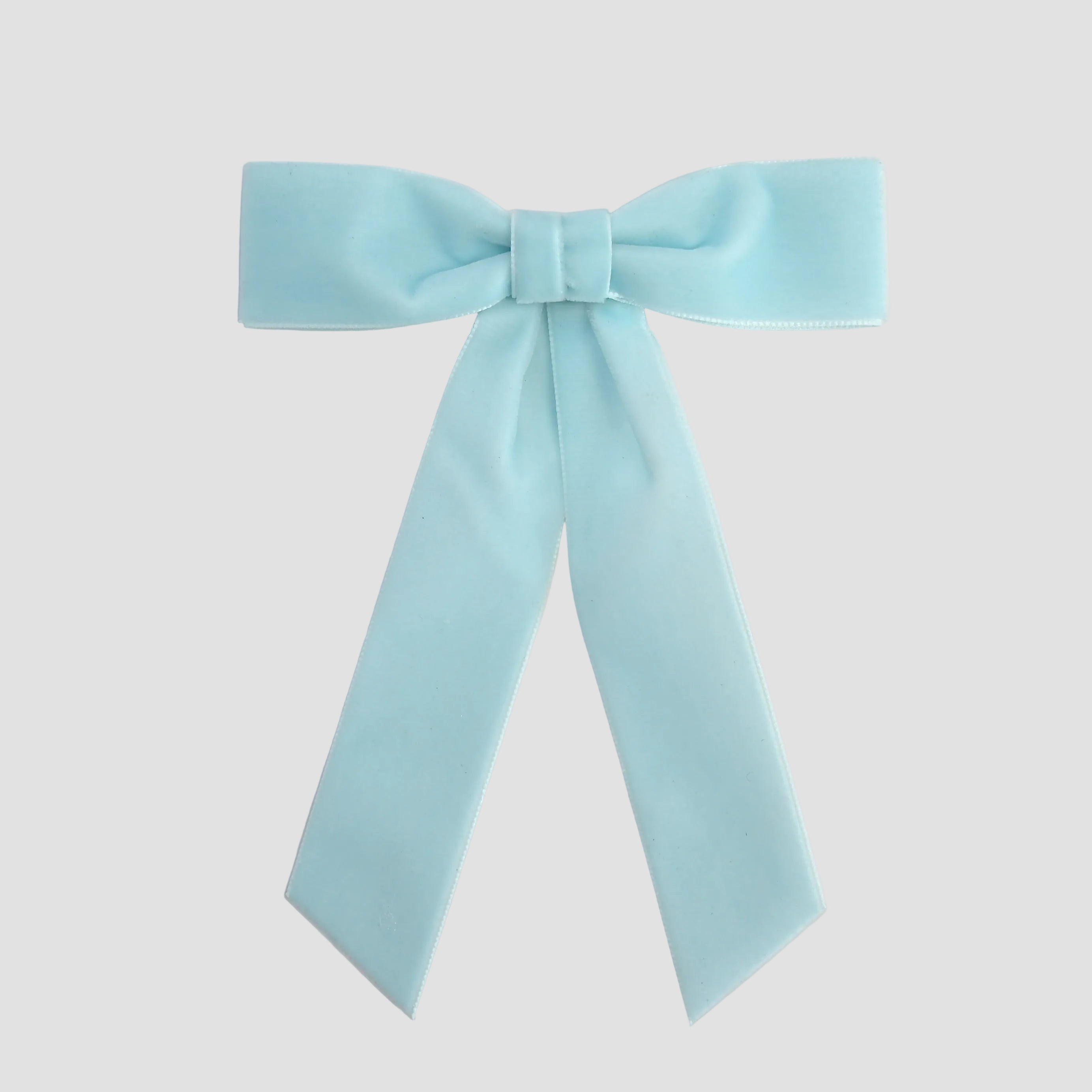 Light blue Zoe petite velvet hair bow on a white background.