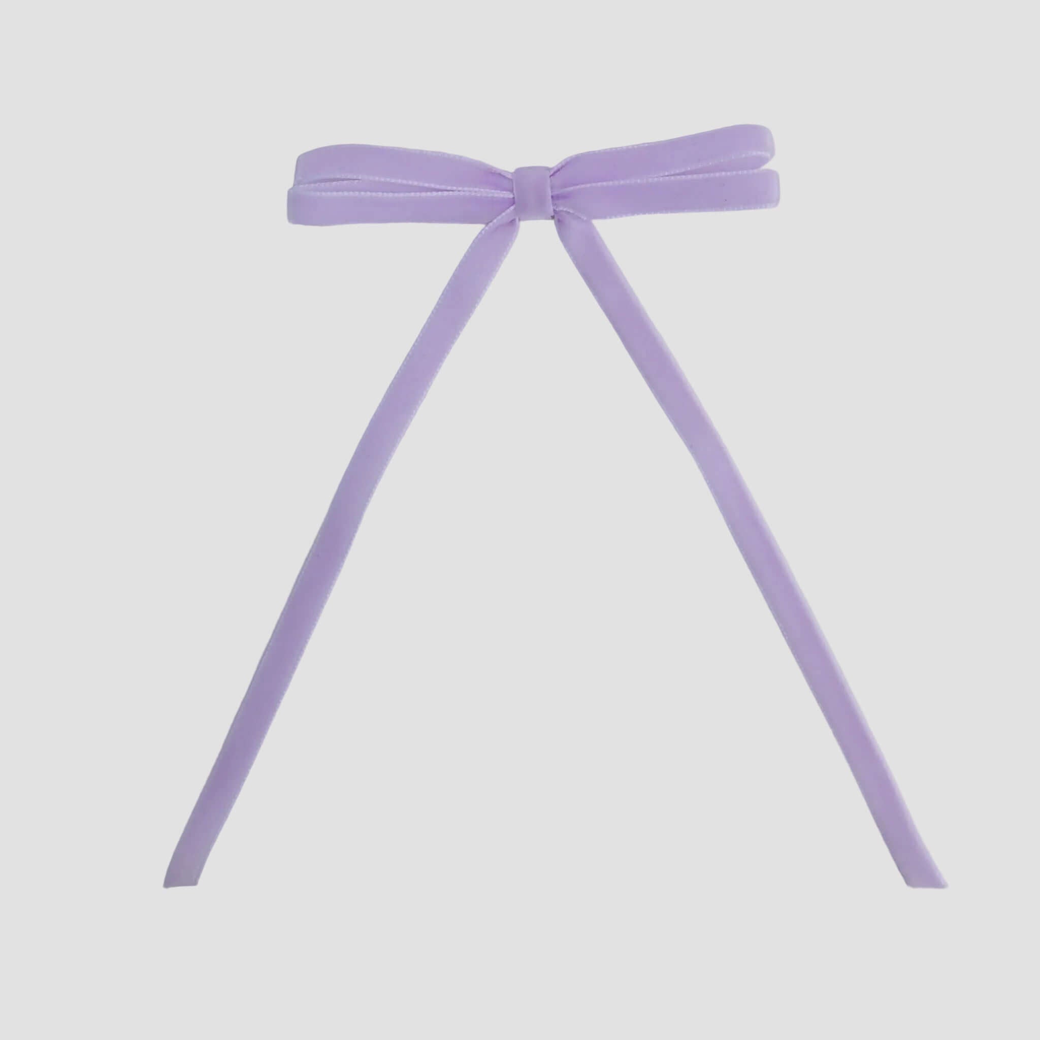 Lilac Olivia velvet hair bow for women with long tails on white background