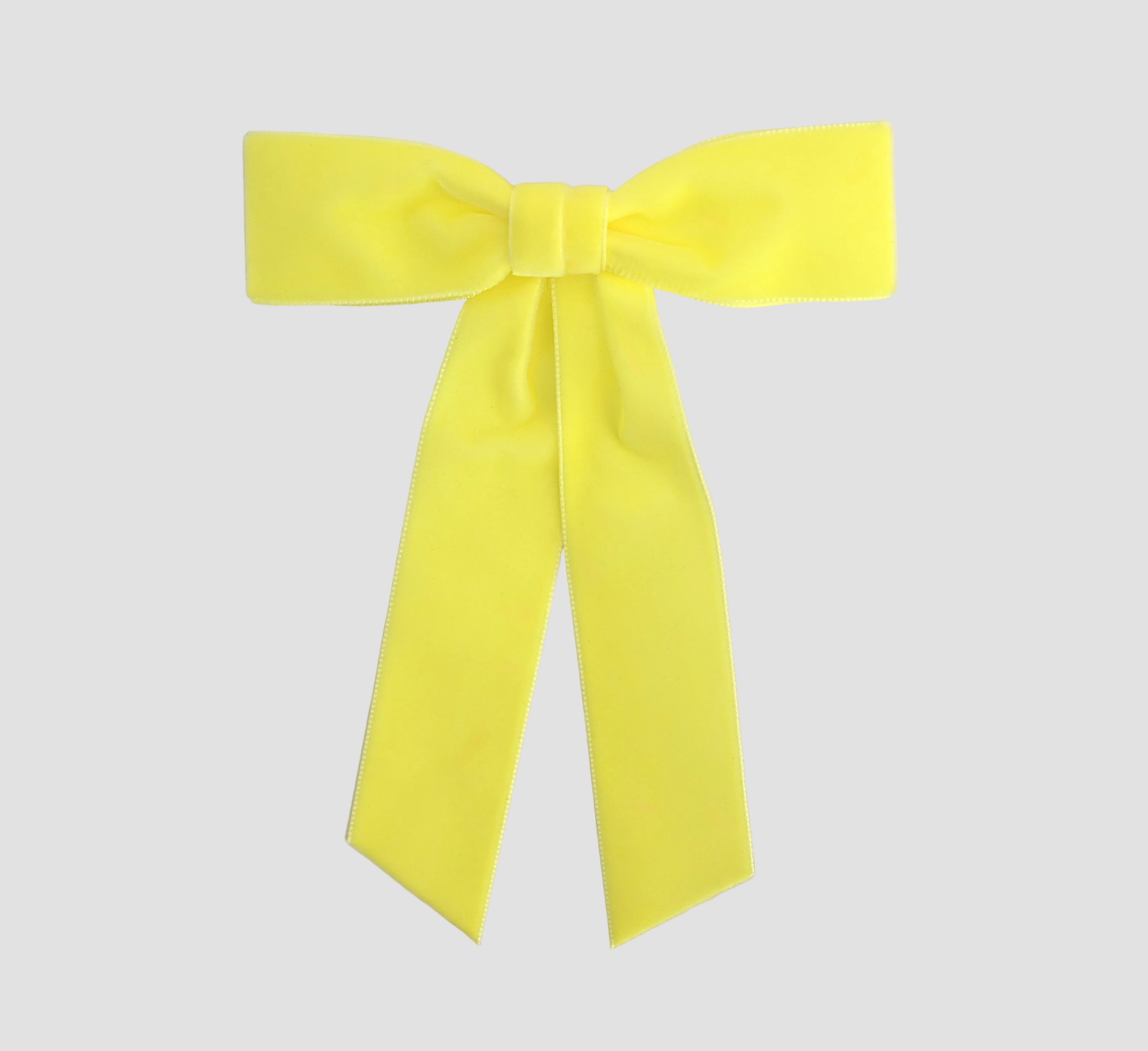 Light yellow - maize Zoe petite velvet hair bow on a white background.