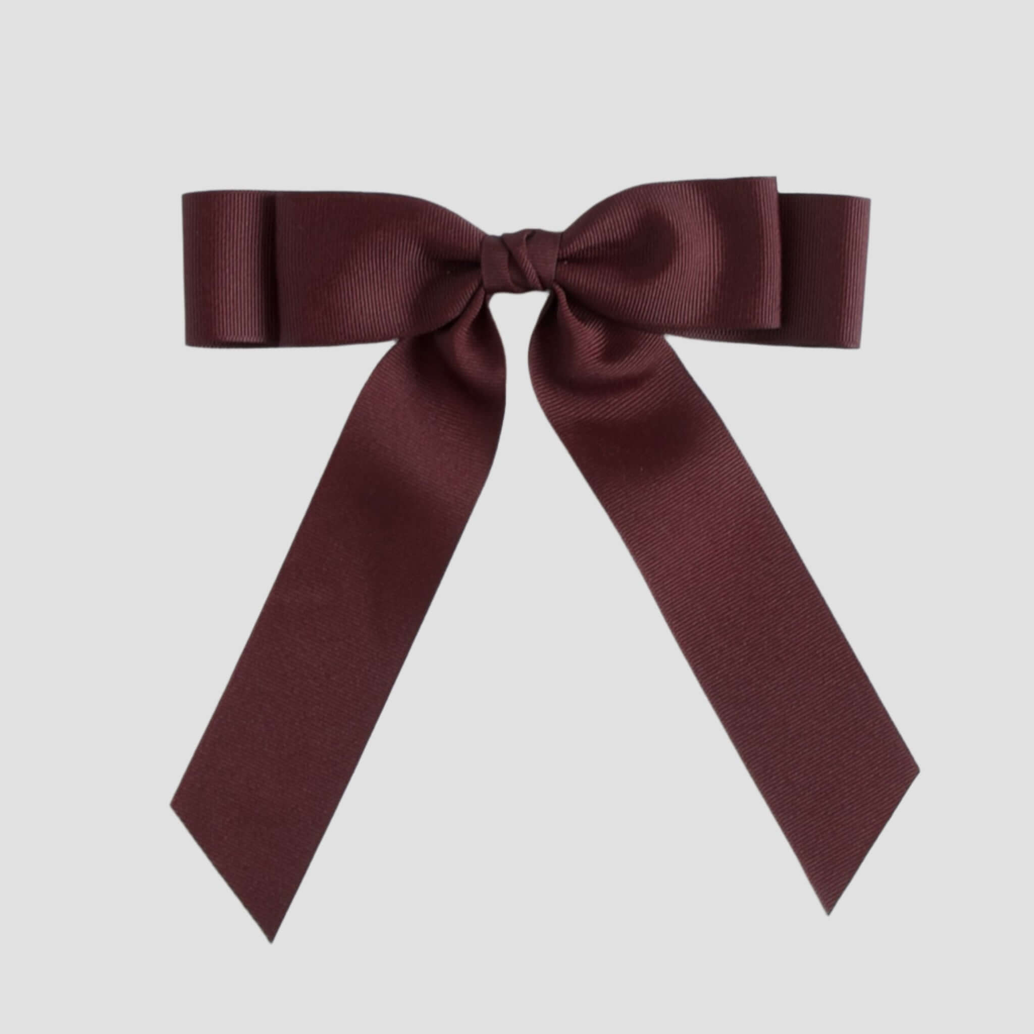 Maroon bow on a white background