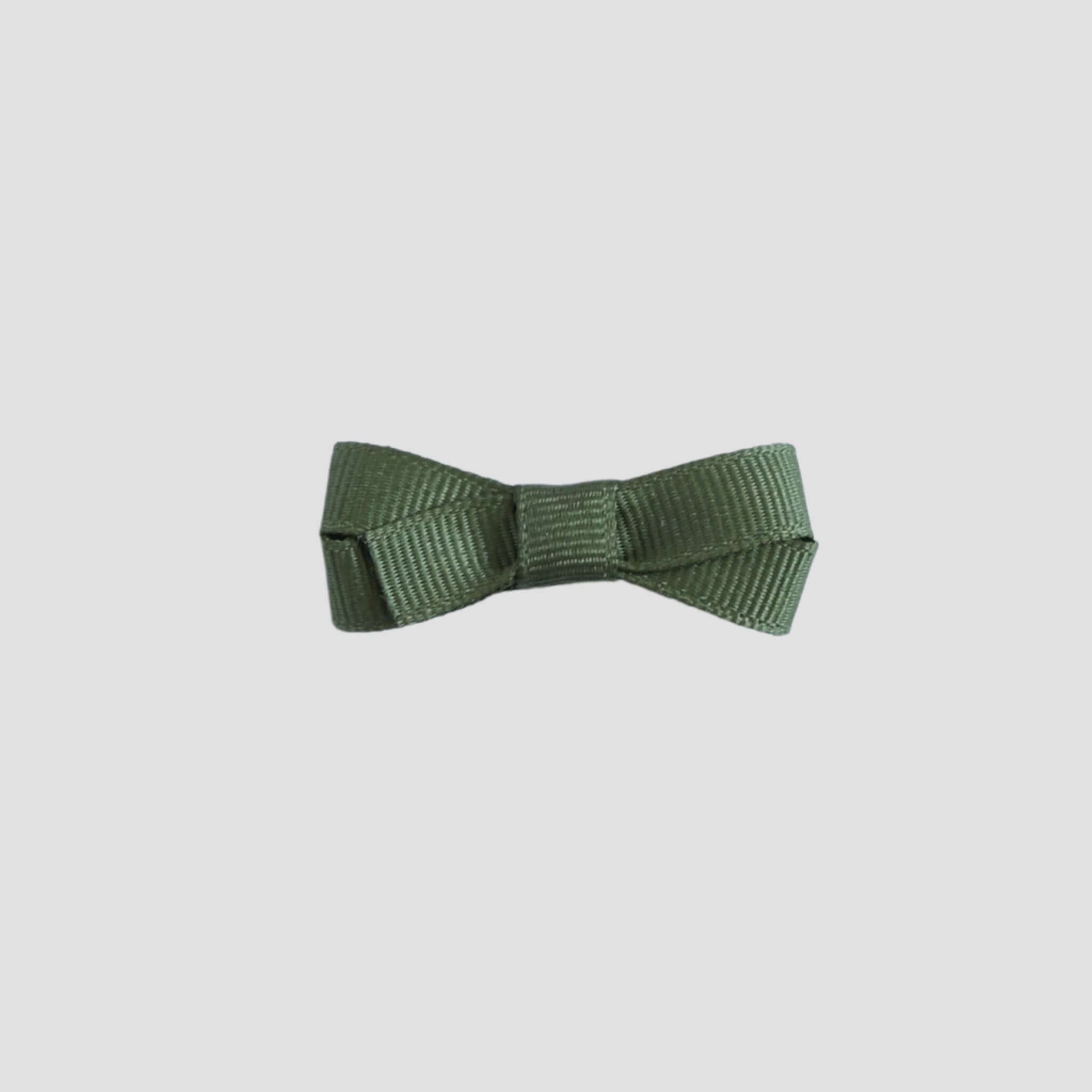 Moss green bow on a white background