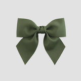 Moss green bow on a white background
