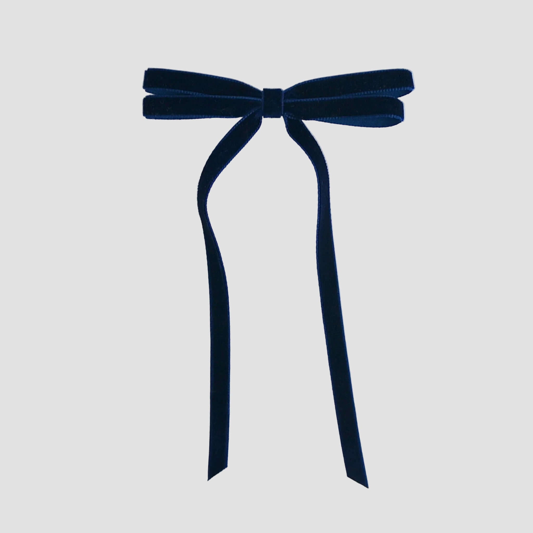 Navy Olivia velvet hair bow for women with long tails on white background
