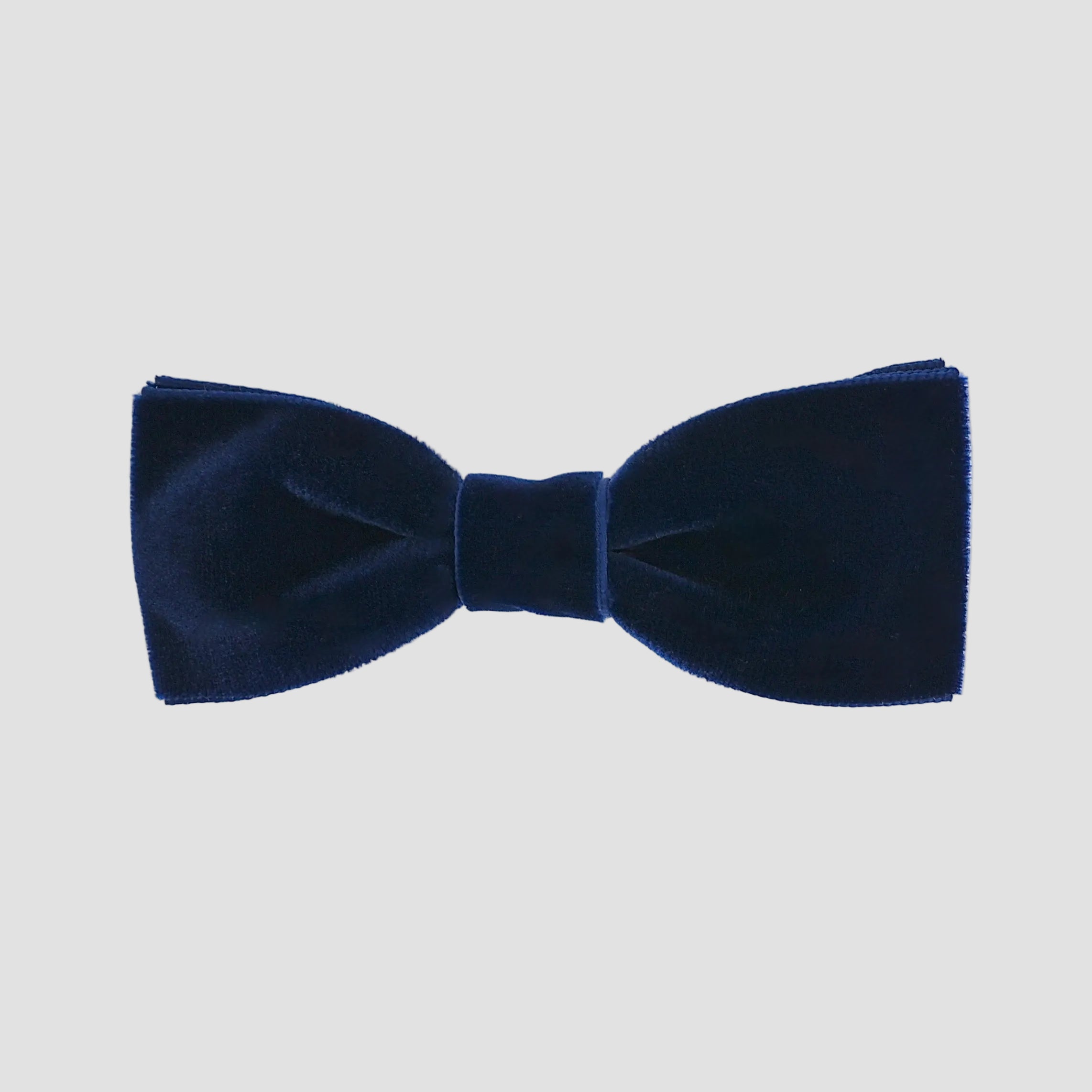 Navy blue men bow tie on a white background.