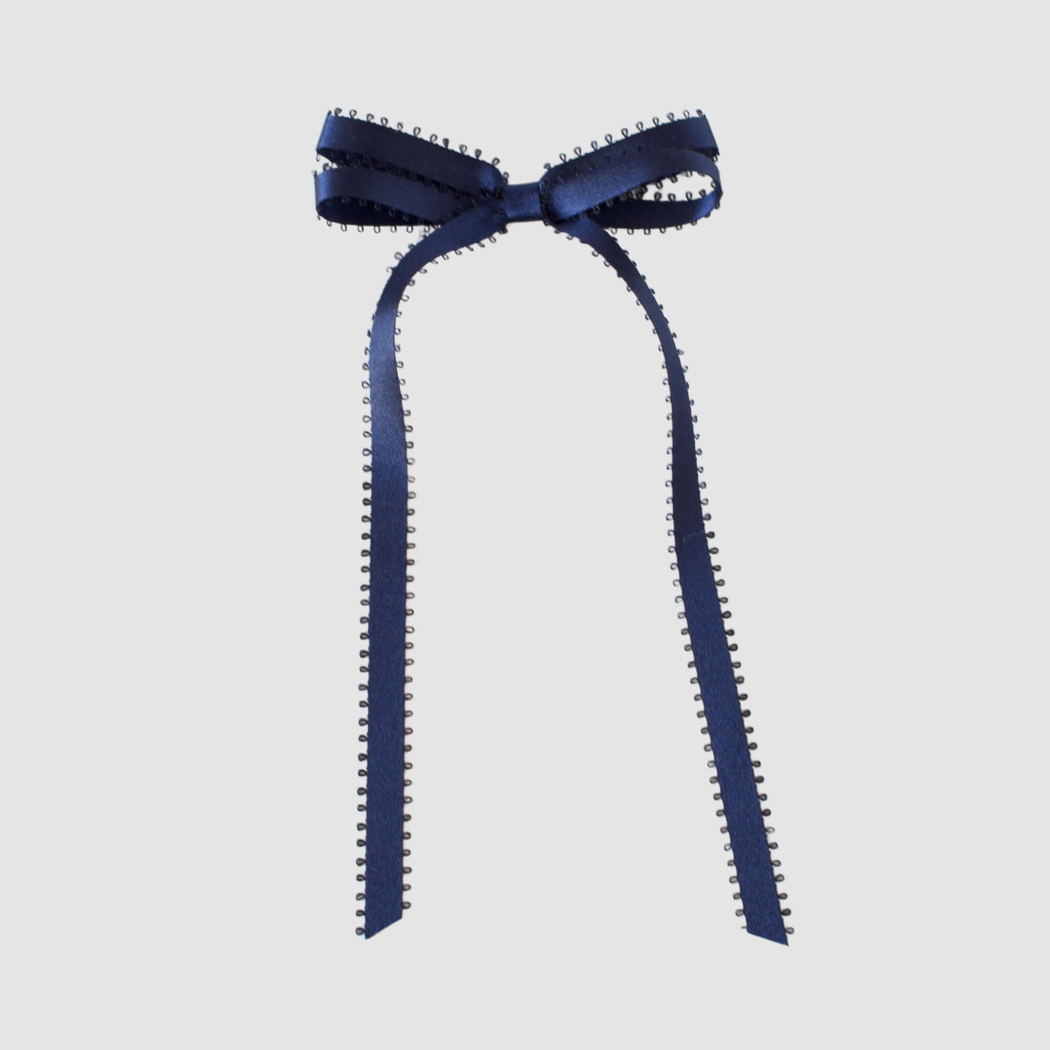 Olivia Picot Satin Bow in navy with picot edges for elegant hairstyles, available with alligator clip or barrette.