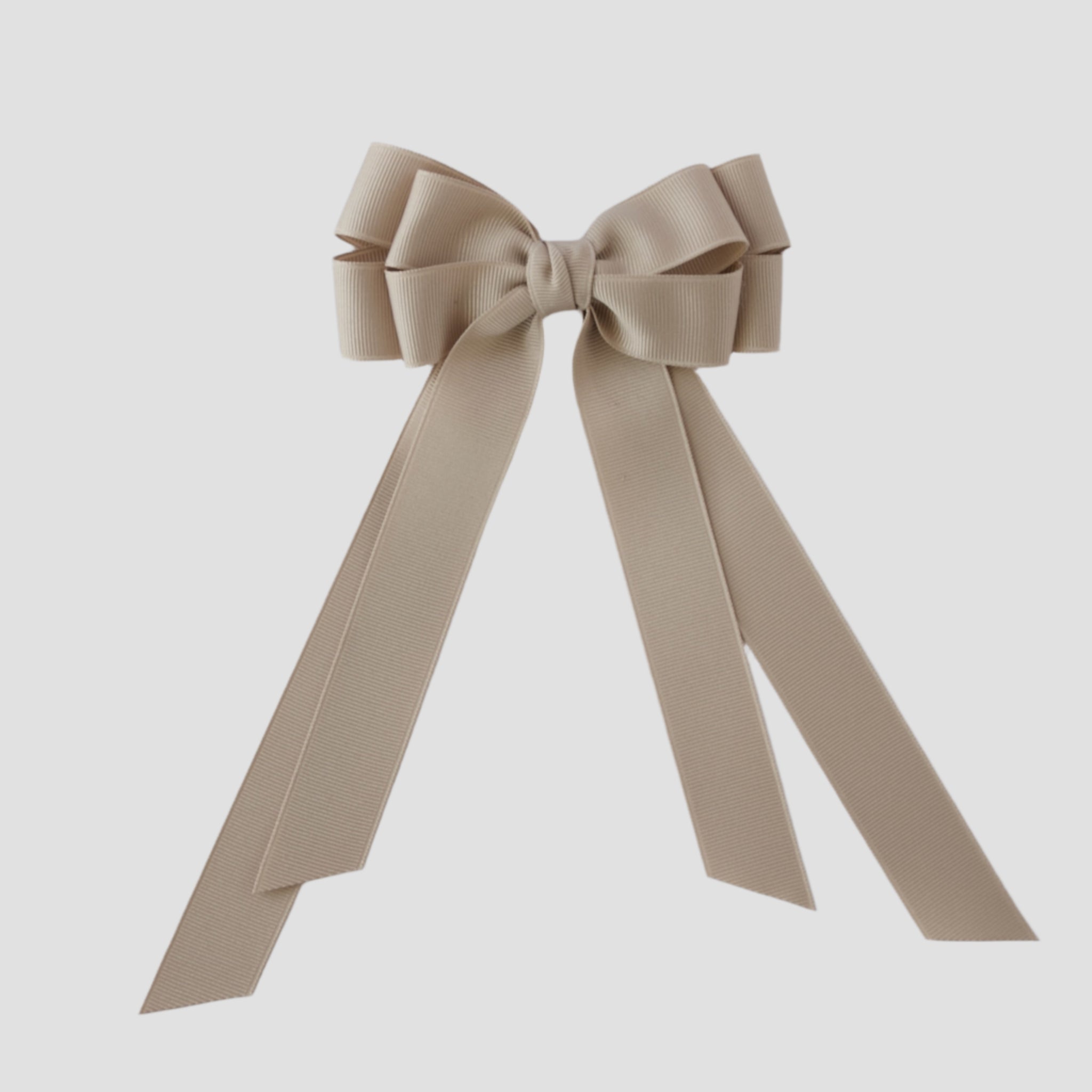 Oatmeal grosgrain Emerson bow with long tails on a white background