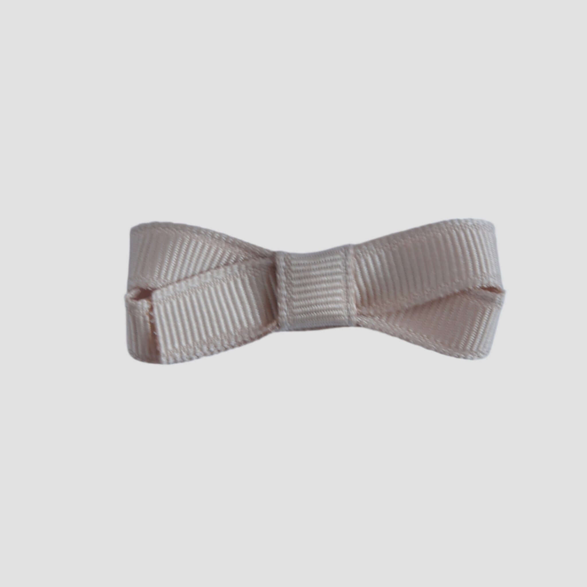 Oatmeal bow tie on a white background