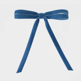 Blue bow barrette for millennium girls.