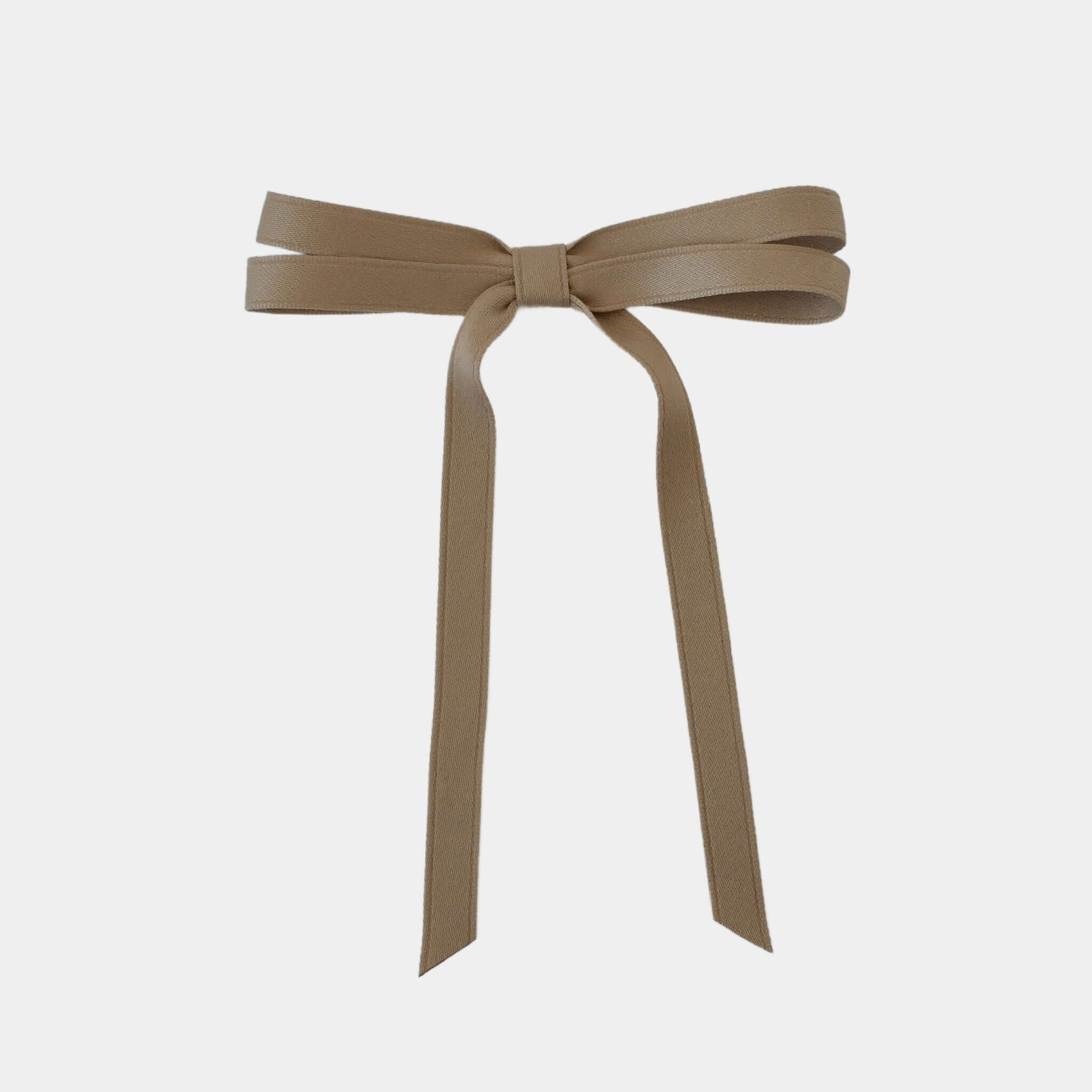 Olivia petite matte satin hair bow in taupe brown on a white background.