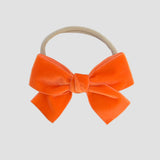 orange Kayla velvet hair bow headband for toddler girl.