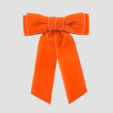 Orange velvet  Mia bow on a white background
