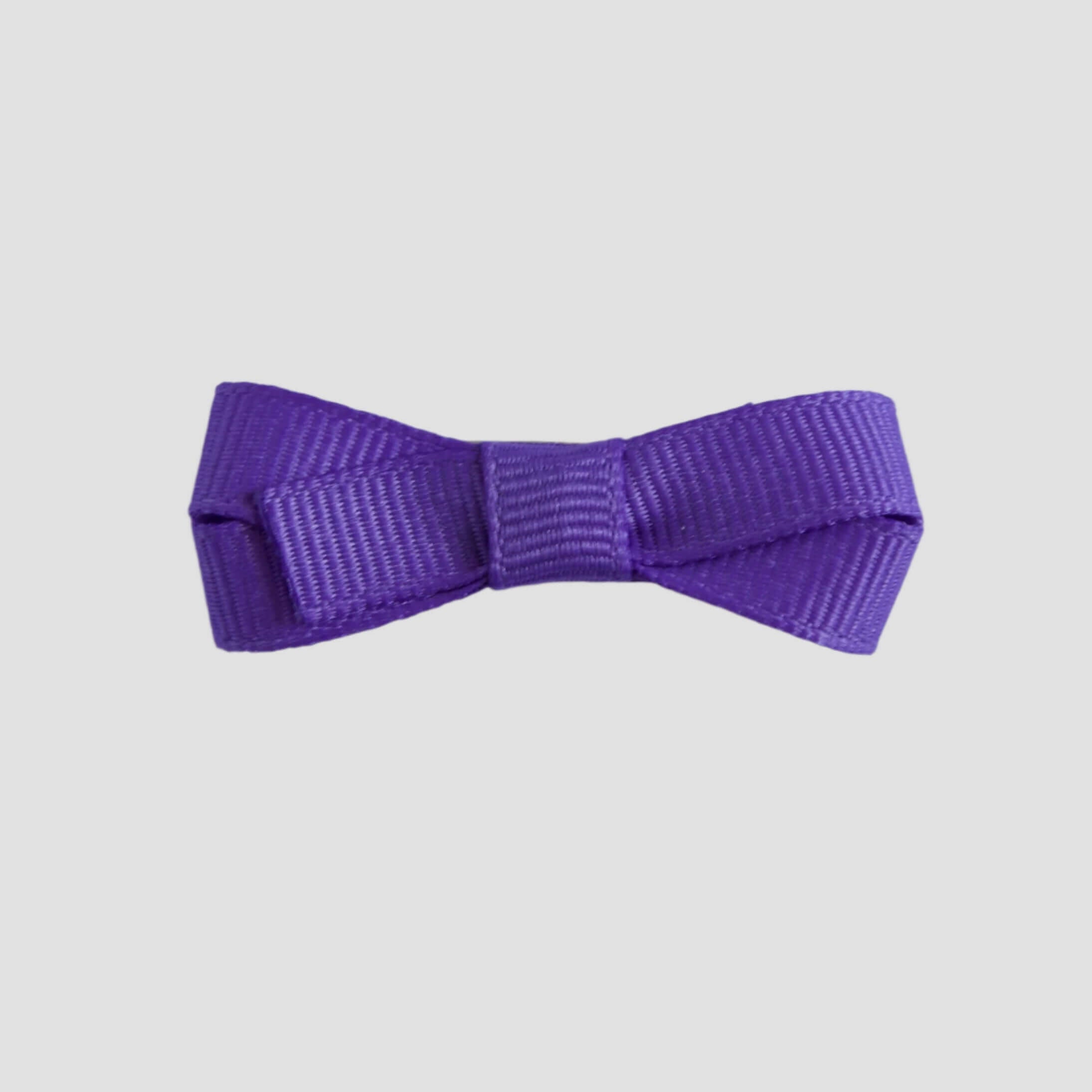 Periwinkle purple bow on a white background