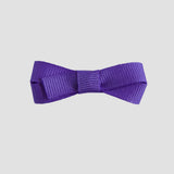 Periwinkle purple bow on a white background