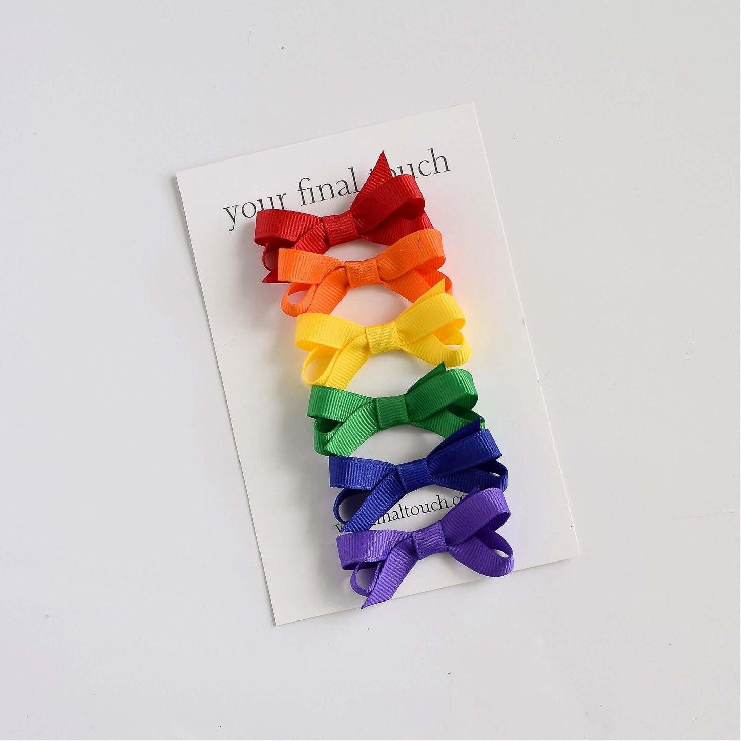 Rainbow color grosgrain ribbon baby and toddler hair bows set with snap clips and no slip grip, perfect for colorful accessorizing.