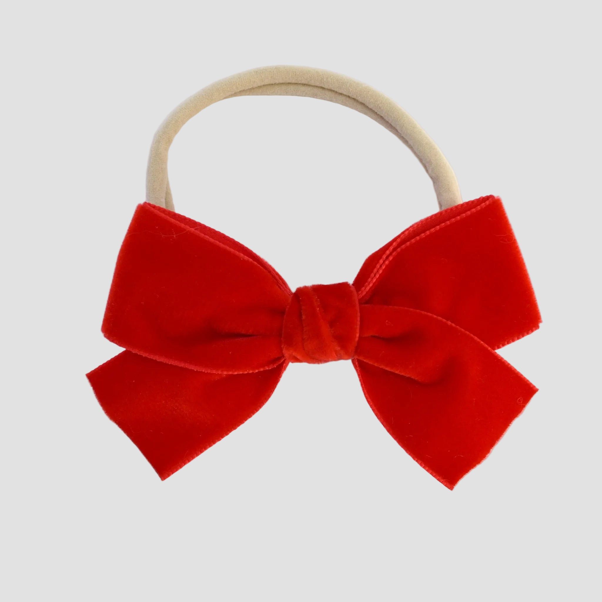 red Kayla velvet hair bow headband for baby girl.