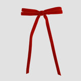 Red Olivia velvet hair bow for women with long tails on white background