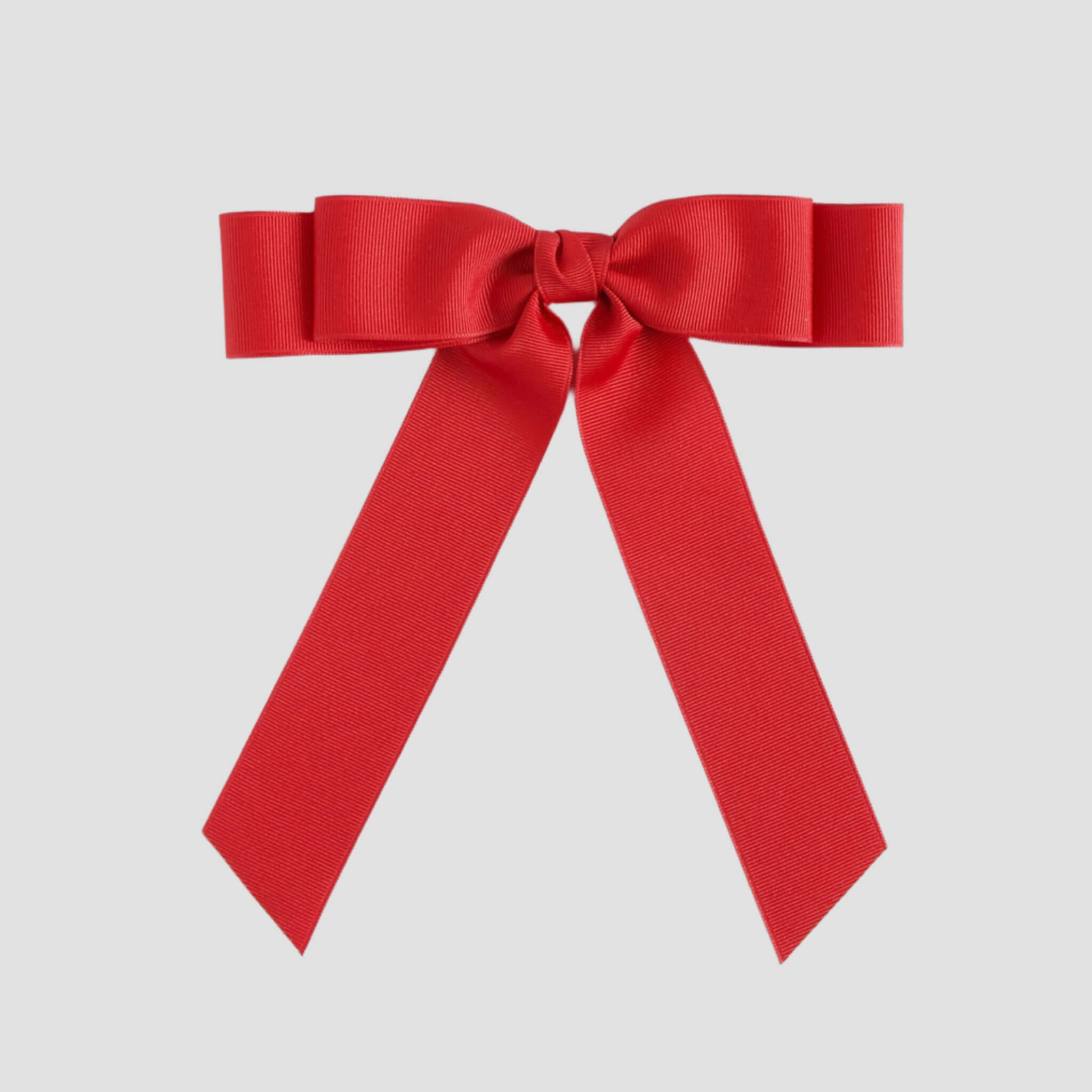 Red bow on a white background