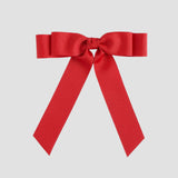 Red bow on a white background
