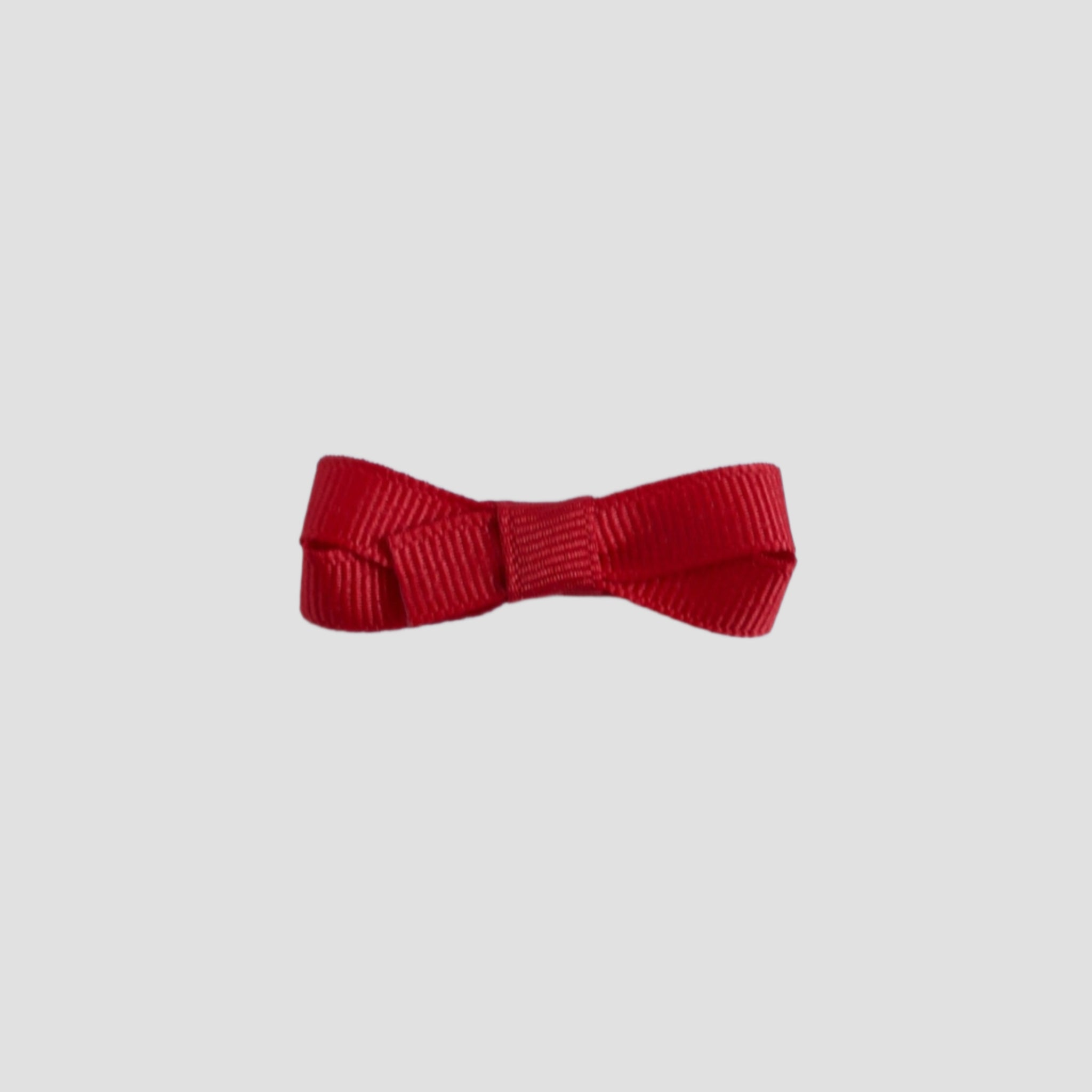 Red bow on a white background