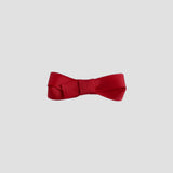 Red bow on a white background