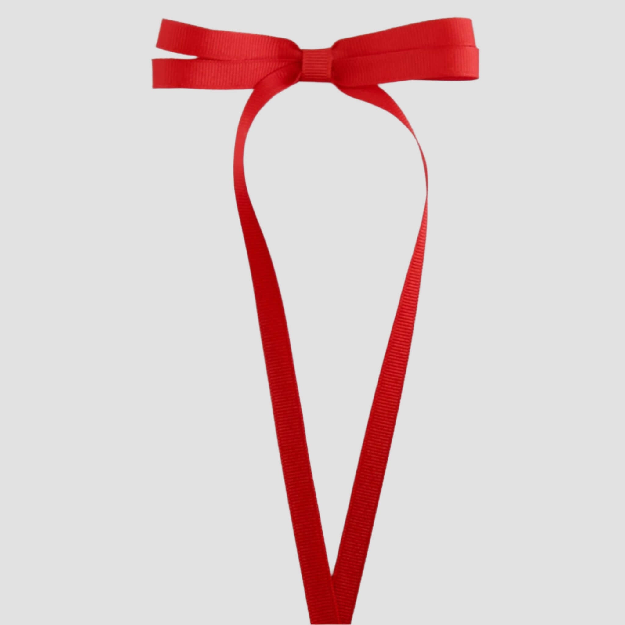 Red ribbon bow on a white background