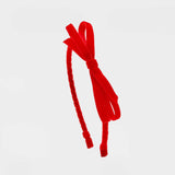 Red velvet bow headband tie on a white background