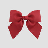 Red bow on a white background