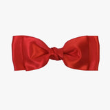 Ava satin bow in red on a white background