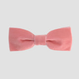 Rose pink men bow tie on a white background.