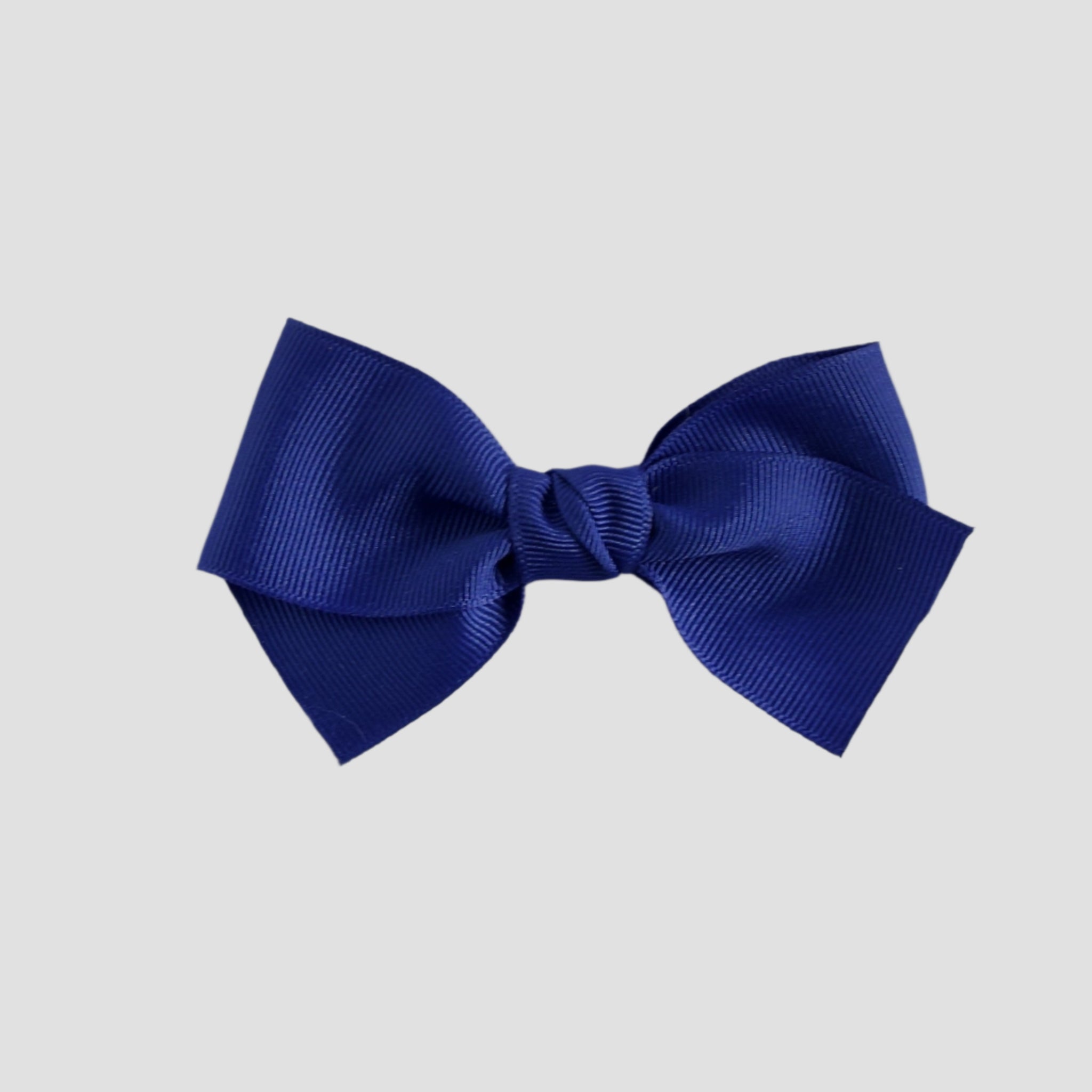 Royal blue bow on a white background