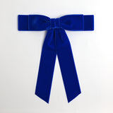Royal blue Grace velvet hair bow for women. Double bow with long tails on white background 