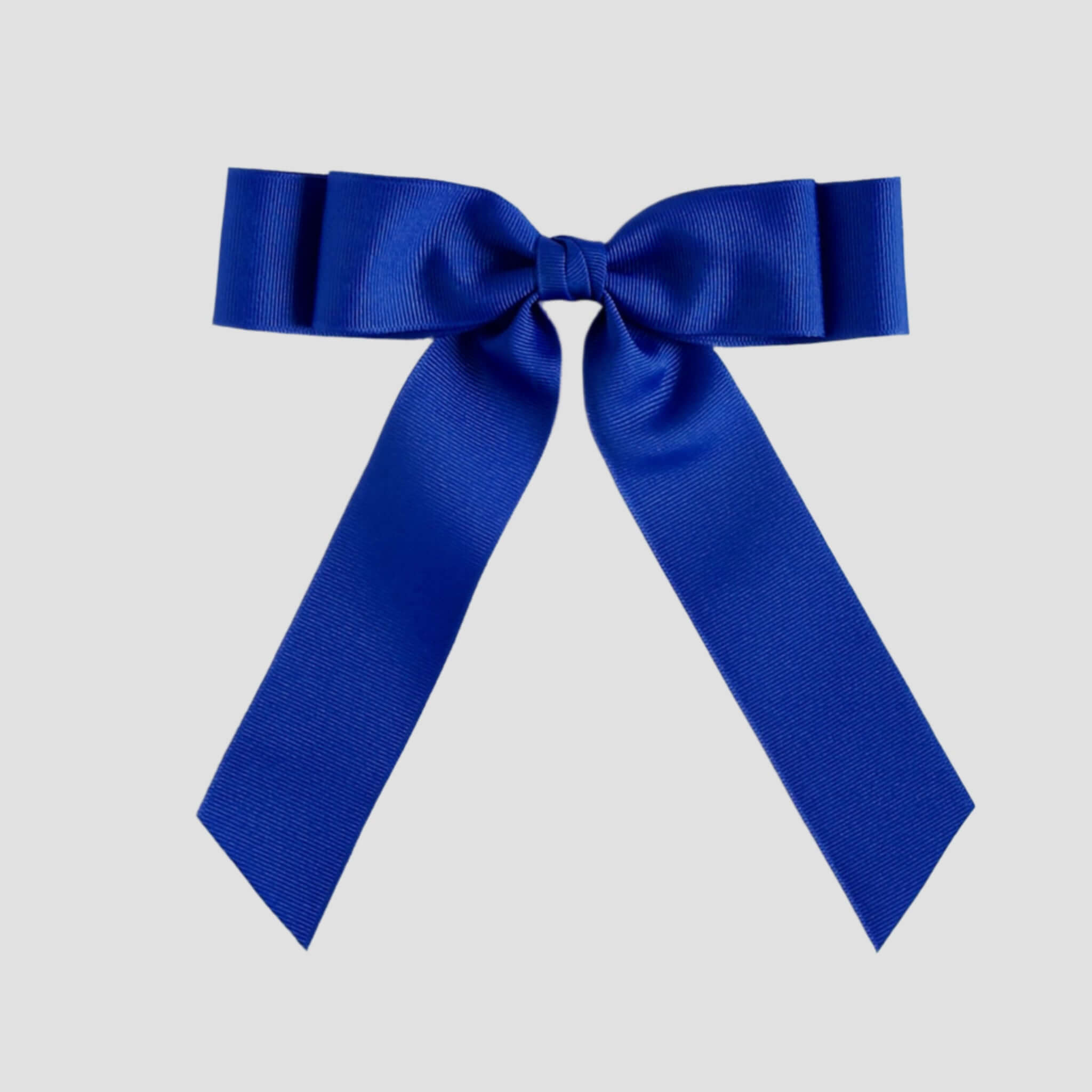 Royal blue bow on a white background