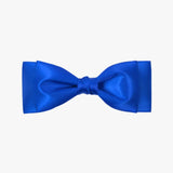 Ava satin bow in royal blue on a white background