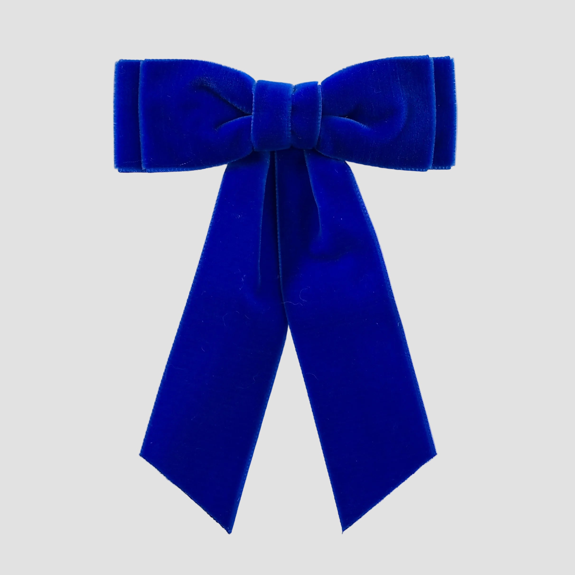 Royal blue velvet Mia bow on a white background