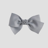 Silver gray bow on a white background