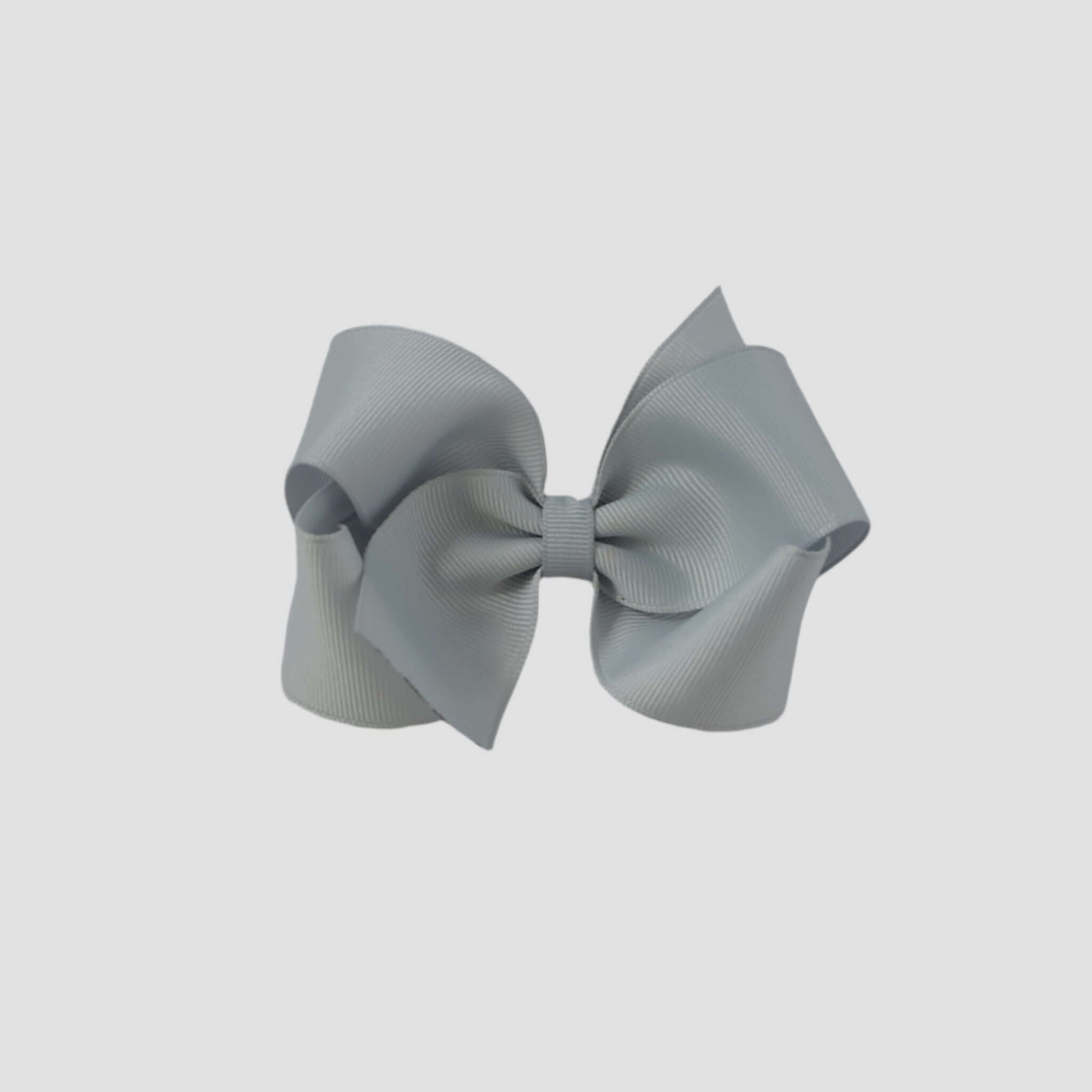 Silver hair bow on a white background