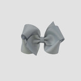 Silver hair bow on a white background