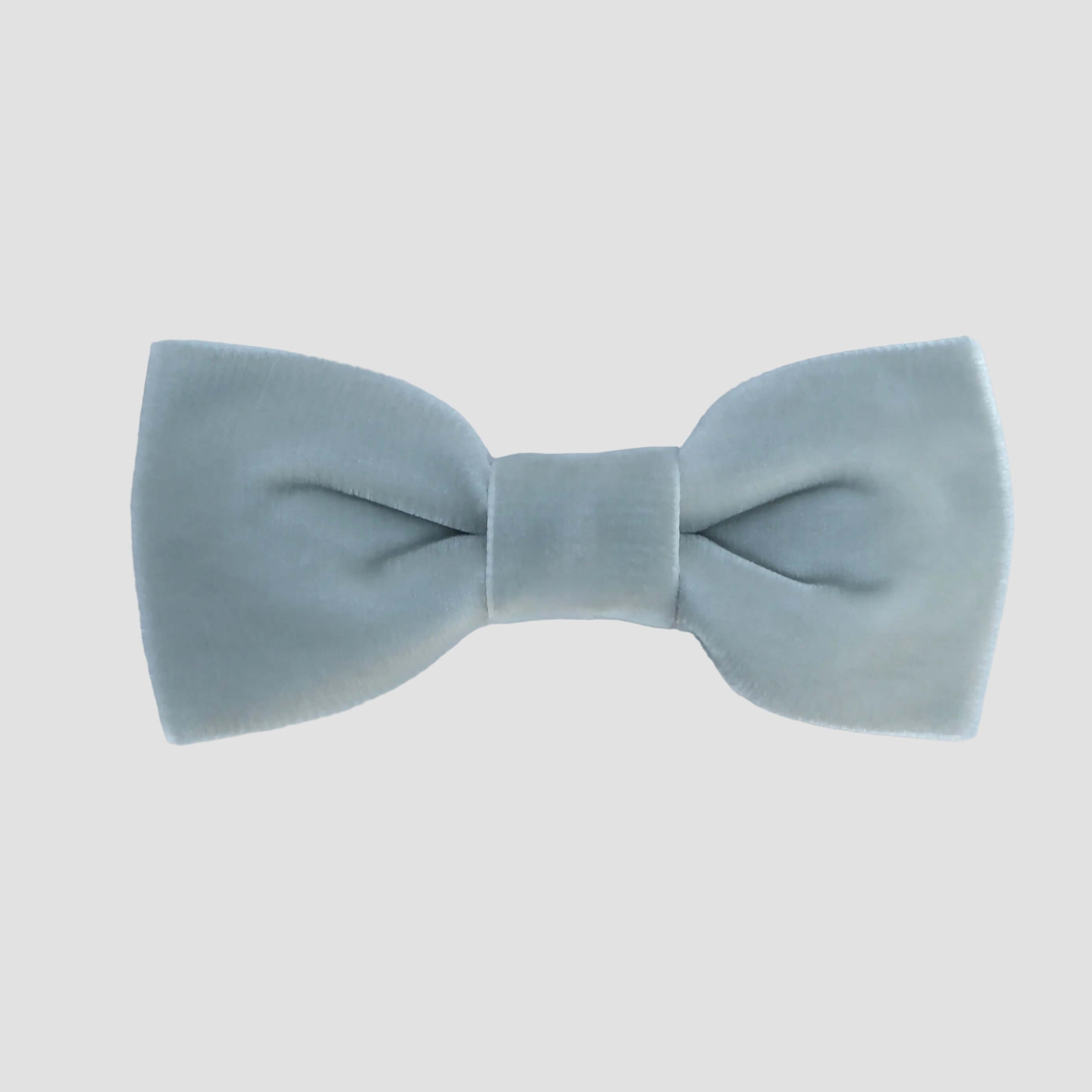 Silver gray velvet bow tie on a white background