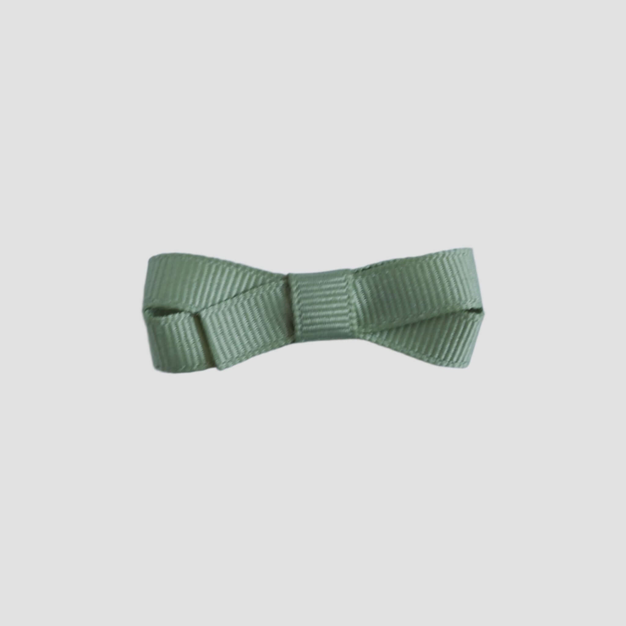 Spring moss green bow tie on a white background