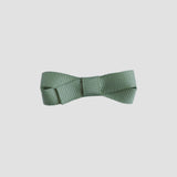 Spring moss green bow tie on a white background